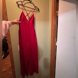 woman’s jumpsuit with crossing straps straps in back